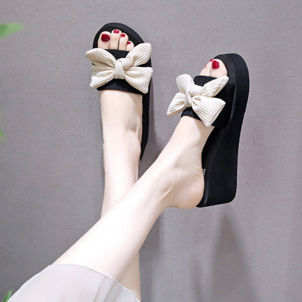 Ženske papuče s platformom i trakom