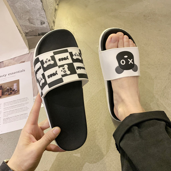 Ležerne ženske papuče za plažu u crno-bijeloj boji