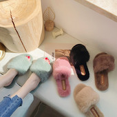 Papuci pufosi pentru femei