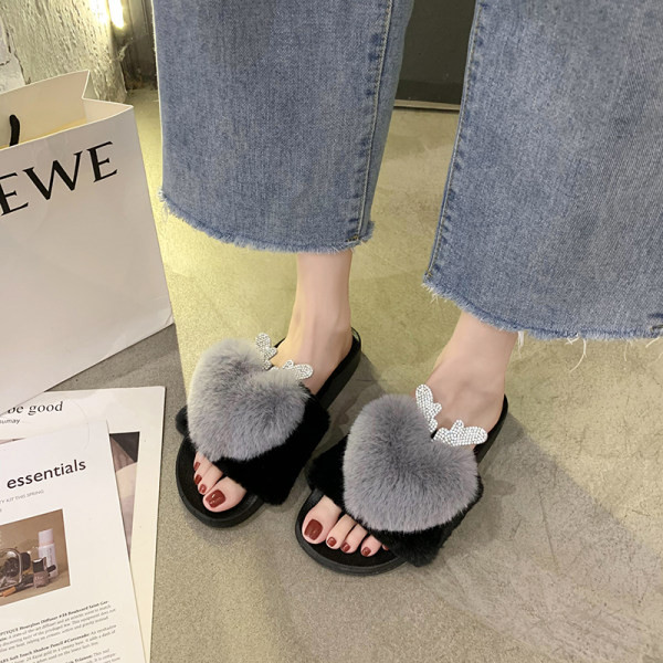 Ležerne ženske ljetne papuče s perom i ravnim potplatom