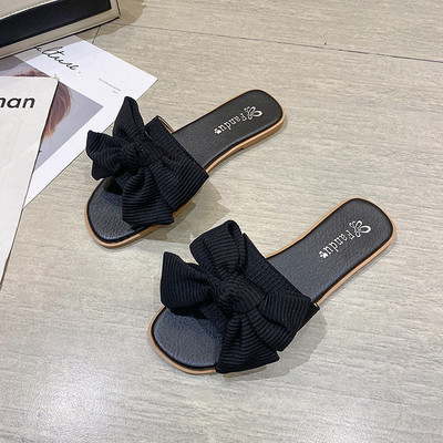 Νέο μοντέλο γυναικείες παντόφλες με κορδέλα και χοντρή σόλα