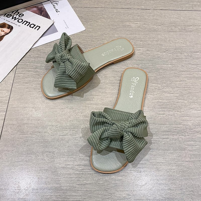 Νέο μοντέλο γυναικείες παντόφλες με κορδέλα και χοντρή σόλα