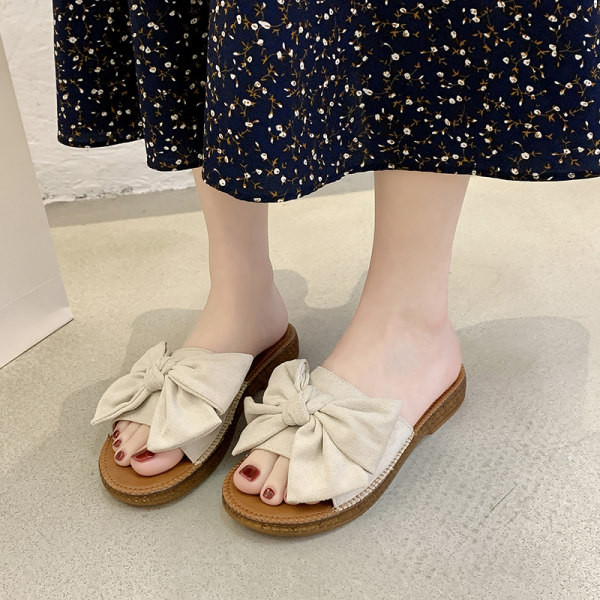 Παντόφλες με λουράκι και κορδέλα από οικολογικό σουέτ