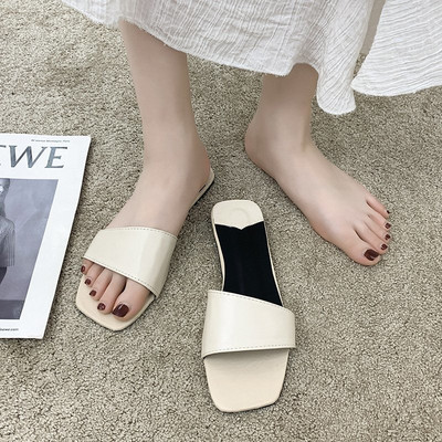 Γυναικείες έκο δερμάτινες παντόφλες με επίπεδη σόλα