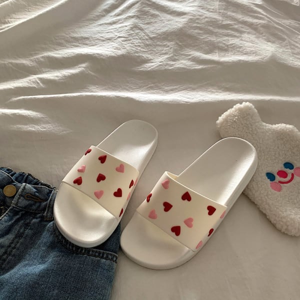 Γυναικείες παντόφλες σε δύο χρώματα με επίπεδη σόλα κατάλληλη για το καλοκαίρι