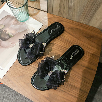 Γυναικείες παντόφλες διακοσμημένες με κορδέλα και πέτρες - επίπεδη σόλα