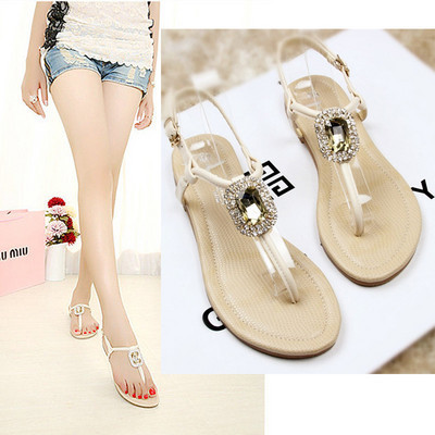 Ženske moderne sandale s ravnim potplatom u bijeloj i crnoj boji