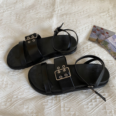 Ženske sandale crne boje sa metalnom kopčom