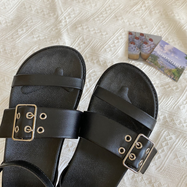 Ženske sandale crne boje sa metalnom kopčom