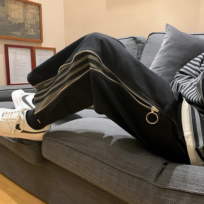 Muški široki model hlača s rubom i patentnim zatvaračem