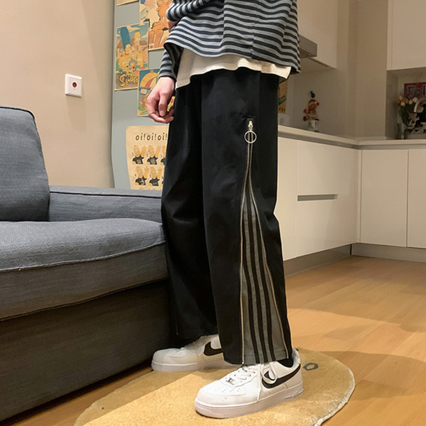 Muški široki model hlača s rubom i patentnim zatvaračem