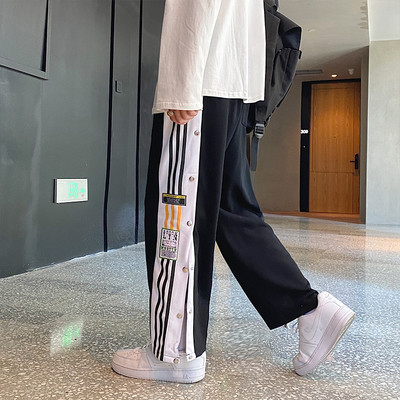 Ανδρικό παντελόνι  φαδύ μοντέλο με άκρα και κουμπιά