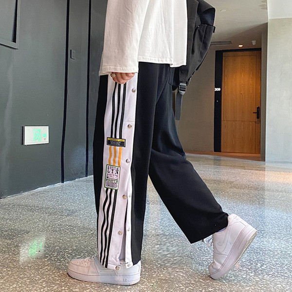 Ανδρικό παντελόνι  φαδύ μοντέλο με άκρα και κουμπιά