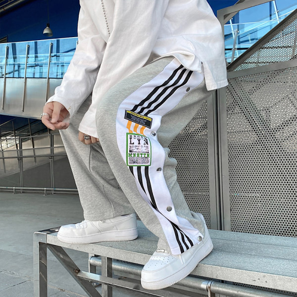 Ανδρικό παντελόνι  φαδύ μοντέλο με άκρα και κουμπιά