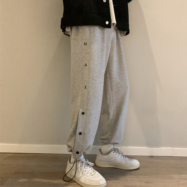 Vīriešu bikšu taisns modelis ar pogām un saitēm