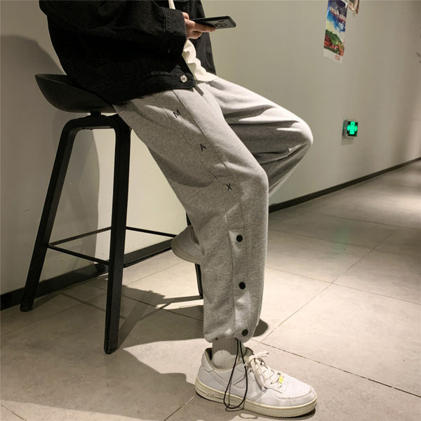 Vīriešu bikšu taisns modelis ar pogām un saitēm