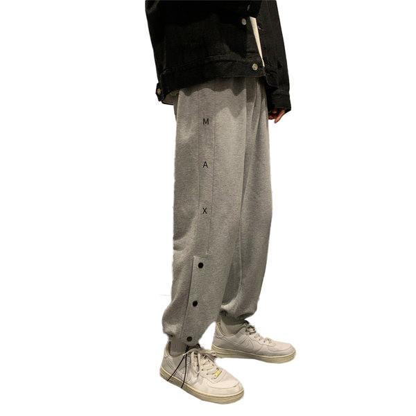 Vīriešu bikšu taisns modelis ar pogām un saitēm