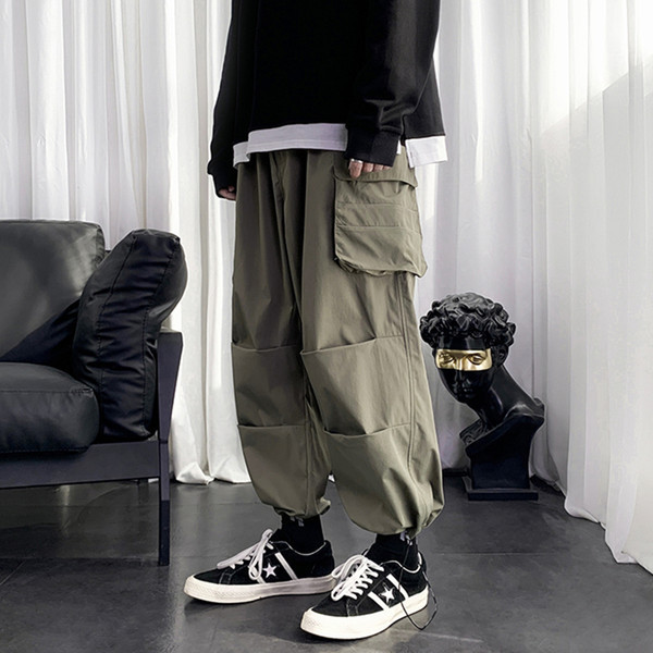 Muški široki model hlača s džepovima sa strane