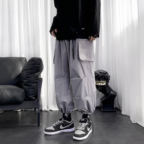 Muški široki model hlača s džepovima sa strane