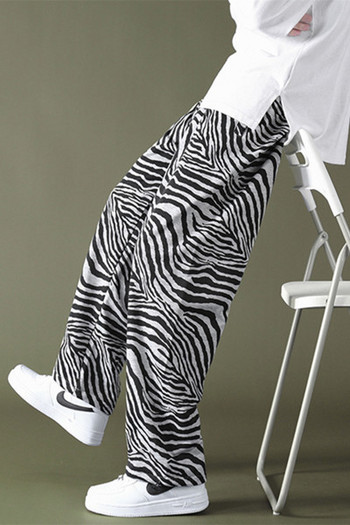 Ανδρικό παντελόνι με άνιμαλ πριντ - φαρδύ μοντέλο           