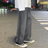 Ανδρικό παντελόνι - απλό φαρδύ μοντέλο με μπορντούρα