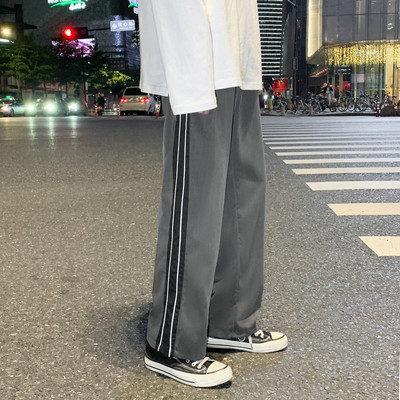 Ανδρικό παντελόνι - απλό φαρδύ μοντέλο με μπορντούρα