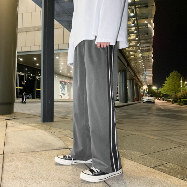 Ανδρικό παντελόνι - απλό φαρδύ μοντέλο με μπορντούρα