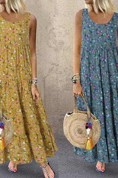 Ilga moteriška suknelė su petnešėlėmis ir gėlių raštu