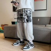 Muške sportsko-elegantne hlače s aplikacijom