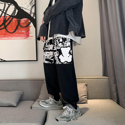 Muške sportsko-elegantne hlače s aplikacijom