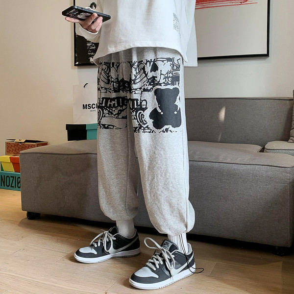 Muške sportsko-elegantne hlače s aplikacijom