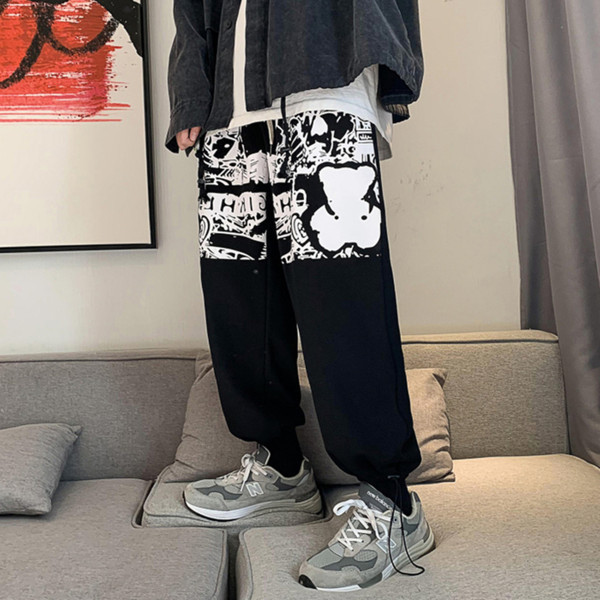 Muške sportsko-elegantne hlače s aplikacijom