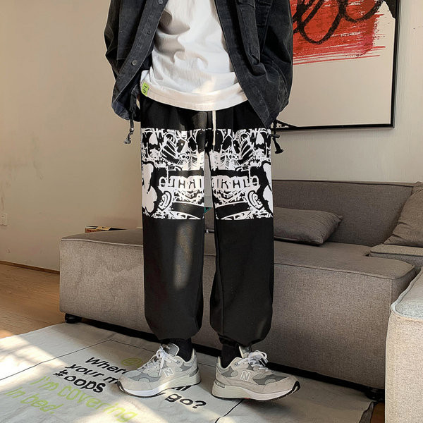 Muške sportsko-elegantne hlače s aplikacijom