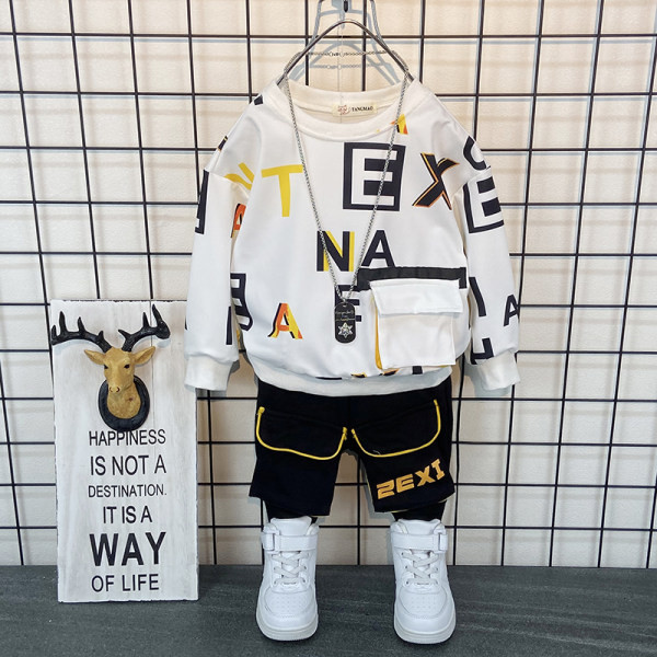 Παιδικό σετ ανοιξιάτικο  με τσέπη και οβάλ λαιμόκοψη σε μαύρο και άσπρο χρώμα