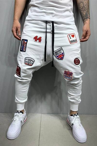 Vīriešu sportiski elegantas bikses ar aplikācijām un saitēm