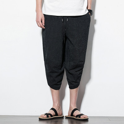 Pantaloni bărbați în dungi model larg