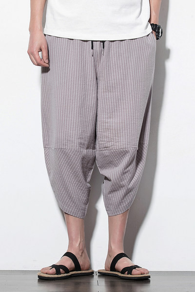 Pantaloni bărbați în dungi model larg