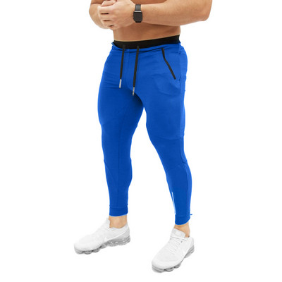 Vyriškos sportinės kelnės plonas modelis su kišenėmis