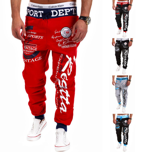 Muške sportske hlače s aplikacijama i natpisima