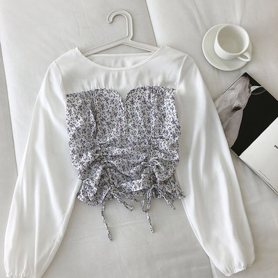 Moderna ženska bluza s vezama i cvjetnim motivima