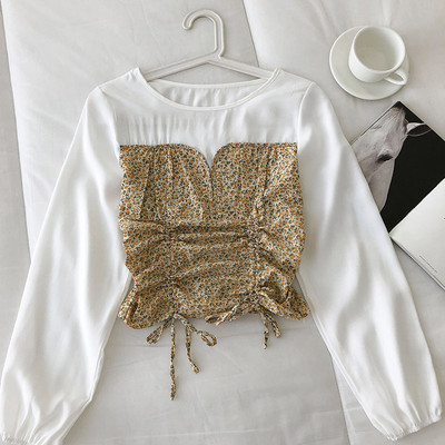 Moderna ženska bluza s vezama i cvjetnim motivima