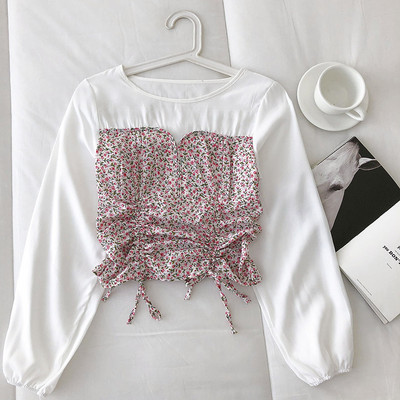 Moderna ženska bluza s vezama i cvjetnim motivima