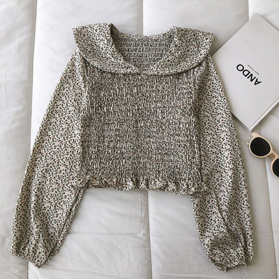 Γυναικεία μπλούζα με λουλουδάτα μοτίβα και μακριά μανίκια