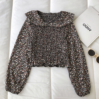 Γυναικεία μπλούζα με λουλουδάτα μοτίβα και μακριά μανίκια