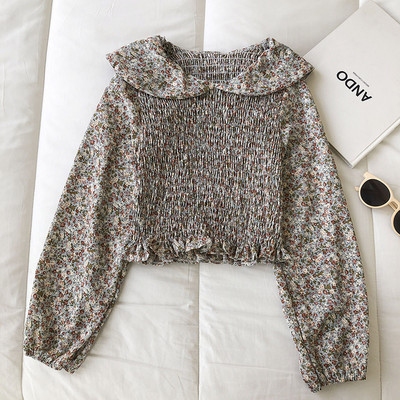 Γυναικεία μπλούζα με λουλουδάτα μοτίβα και μακριά μανίκια