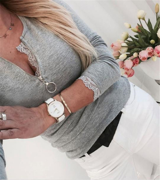 Ženska ležerna bluza s patentnim zatvaračem i čipkom