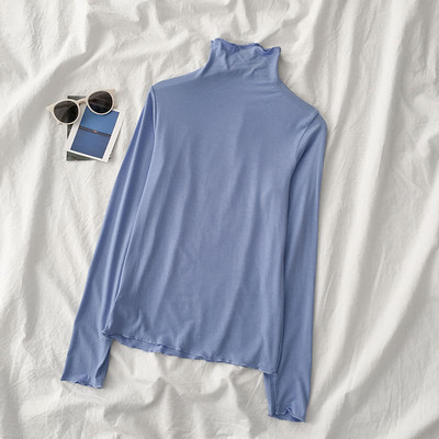 Sieviešu blūzes vienkāršs modelis ar augstu apkakli