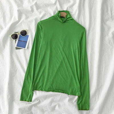 Sieviešu blūzes vienkāršs modelis ar augstu apkakli