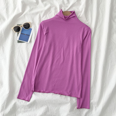 Sieviešu blūzes vienkāršs modelis ar augstu apkakli