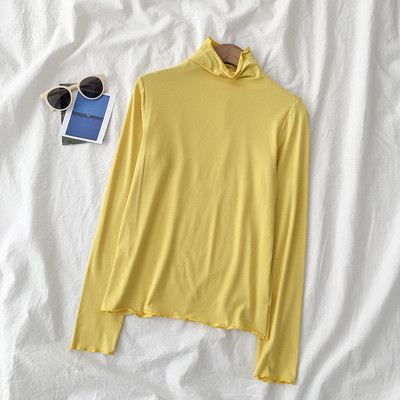 Sieviešu blūzes vienkāršs modelis ar augstu apkakli